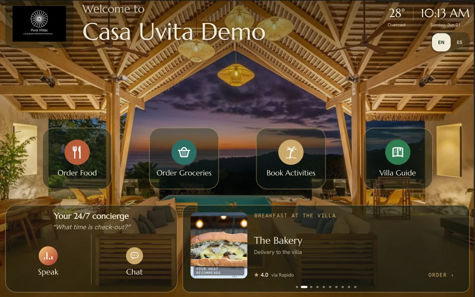 The tablet home screen: a large 'Welcome to Casa Uvita Demo' greeting over a photo of the villa, the temperature and time, tiles for food, groceries, activities and the villa guide, a Speak and Chat concierge panel, and a host-recommended bakery card.